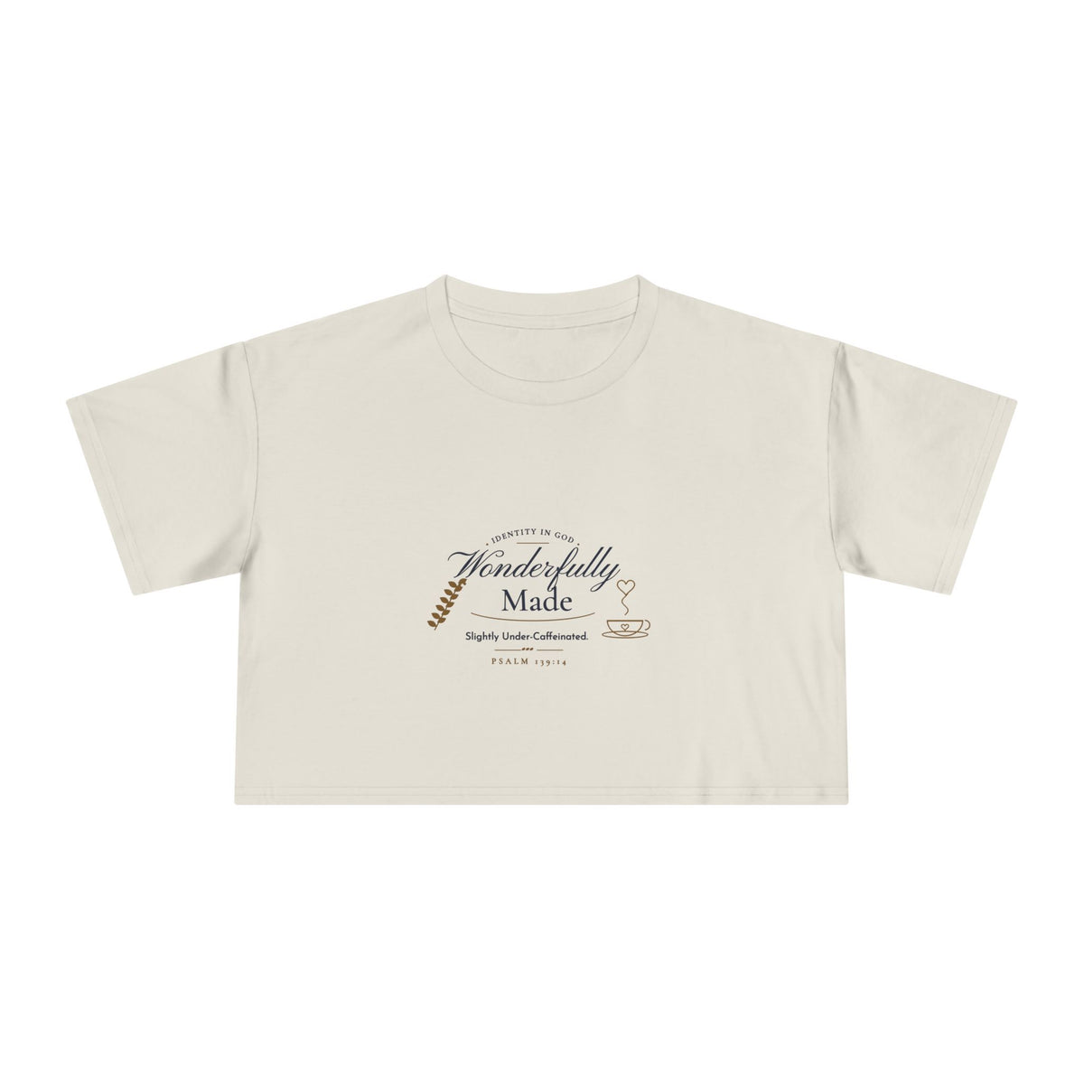 Wonderfully Made Crop Tee in Ecru, front view: IDENTITY IN GOD, Wonderfully Made script with a leaf and coffee cup, Slightly Under-Caffeinated. and PSALM 139:14, Psalm 139:14 (KJV)