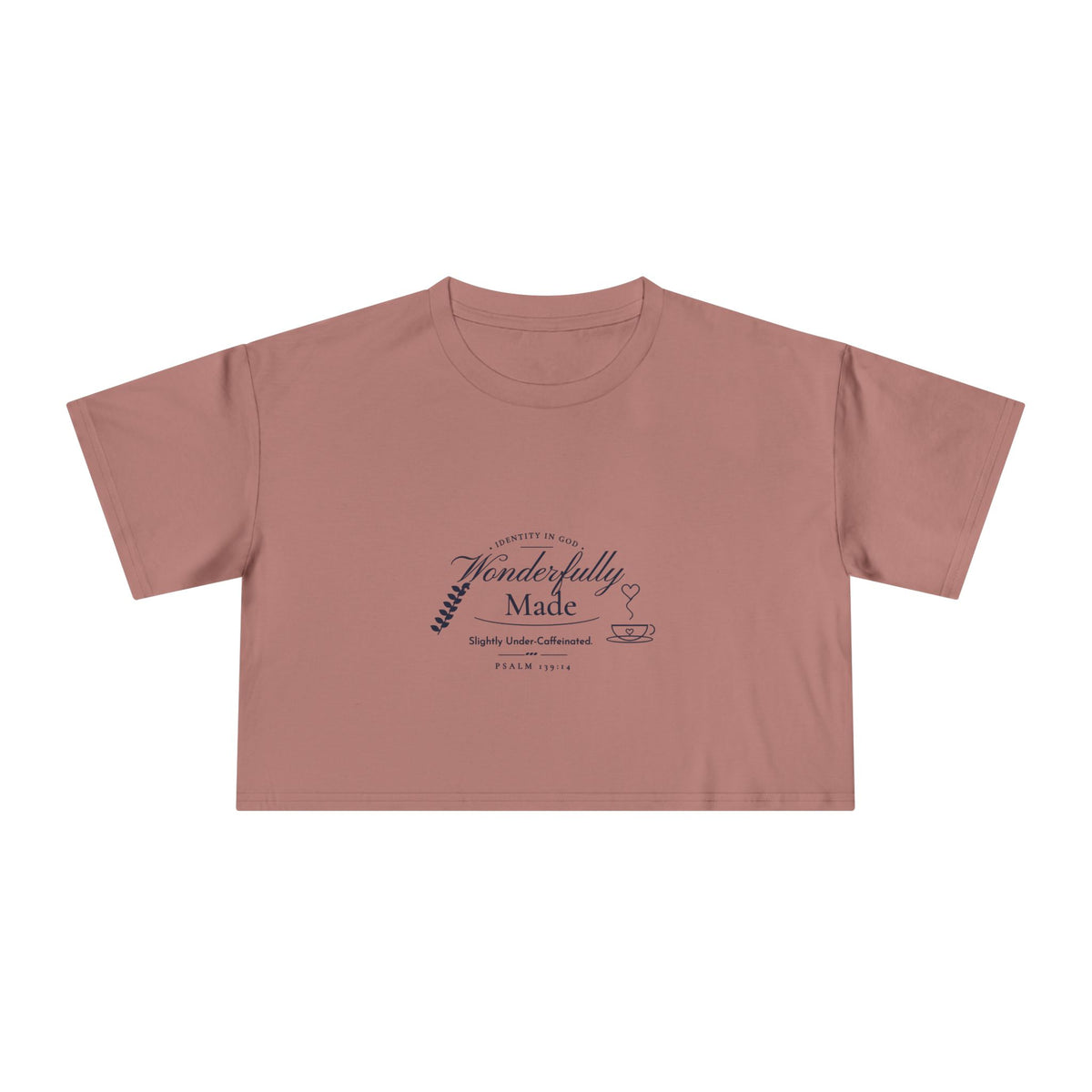 Wonderfully Made Crop Tee in Hazy Pink, front view: IDENTITY IN GOD, Wonderfully Made script with a leaf and coffee cup, Slightly Under-Caffeinated. and PSALM 139:14, Psalm 139:14 (KJV)