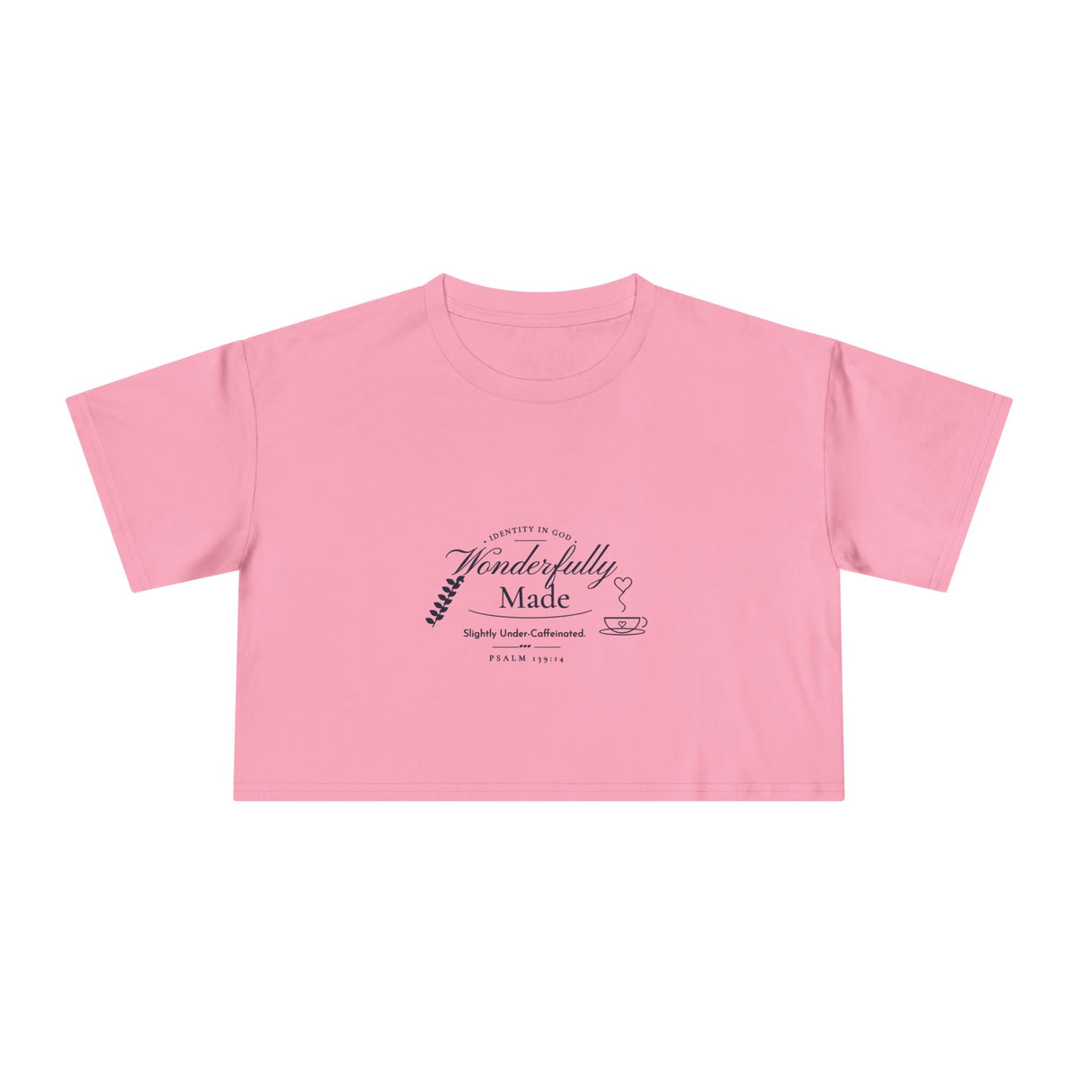 Wonderfully Made Crop Tee in Bubblegum, front view: IDENTITY IN GOD, Wonderfully Made script with a leaf and coffee cup, Slightly Under-Caffeinated. and PSALM 139:14, Psalm 139:14 (KJV)