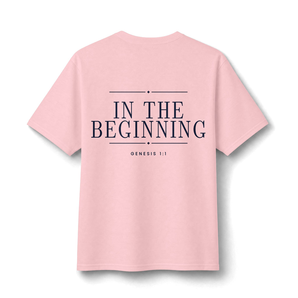 In The Beginning Tee in Classic Pink, back view: large IN THE BEGINNING. with GENESIS 1:1, Genesis 1:1 (KJV)